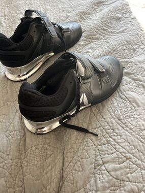 Woman’s Black Athletic lifting Shoes with Metallic Heel Accent